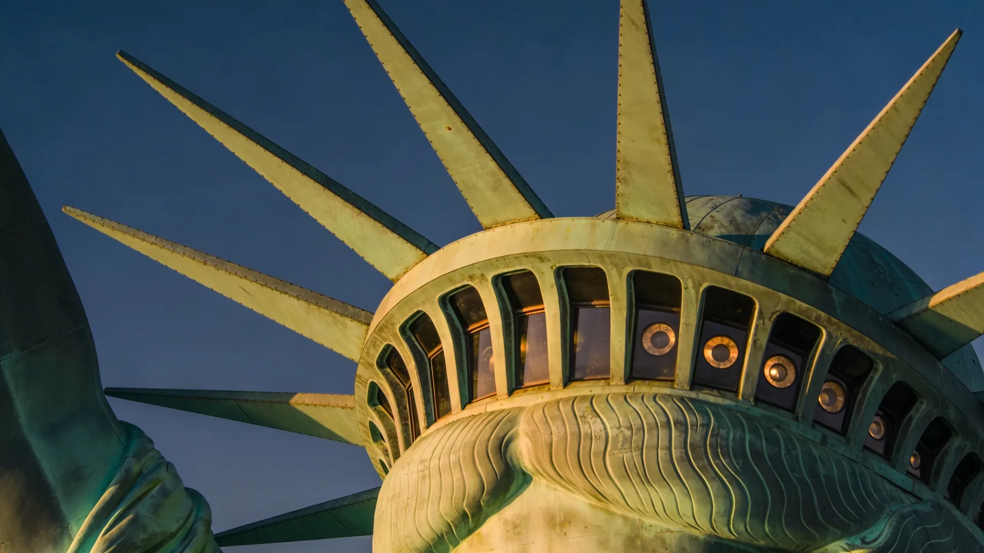 Statue of Liberty crown viewed from below showing seven spike rays — Statue of Liberty crown tickets guide cover