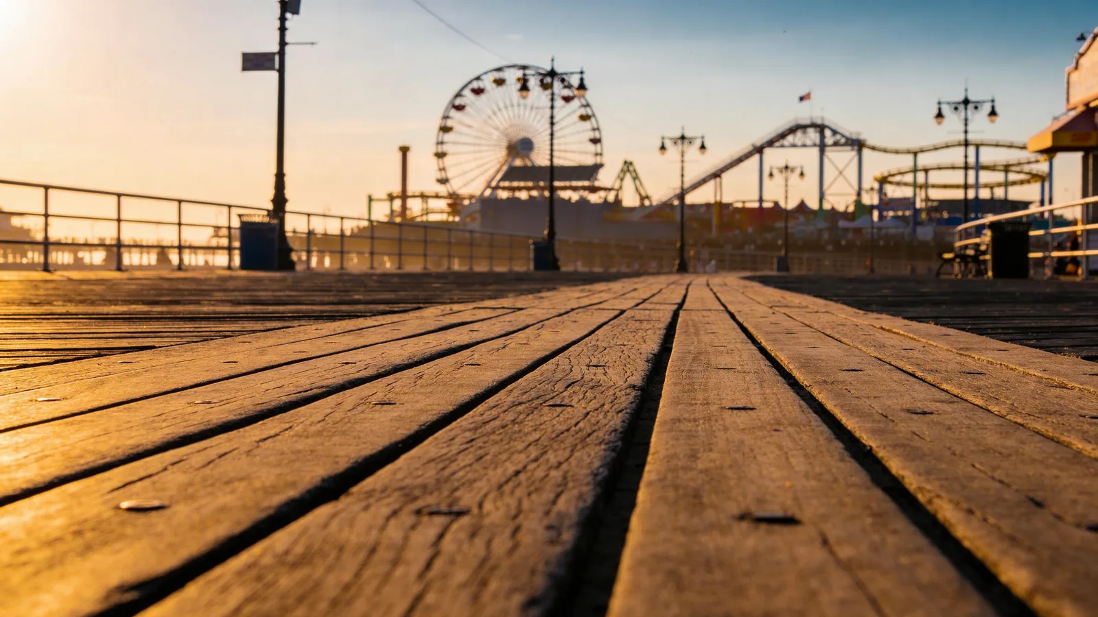 Coney Island boardwalk on a summer evening with the Wonder Wheel — things to do in NYC on July 4th Brooklyn options