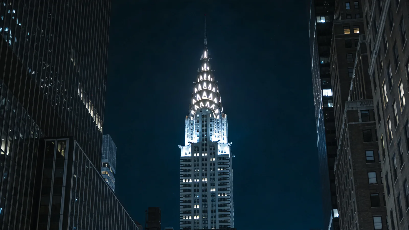 Empire State Building tower at night with illuminated spire — best Empire State Building ticket night view