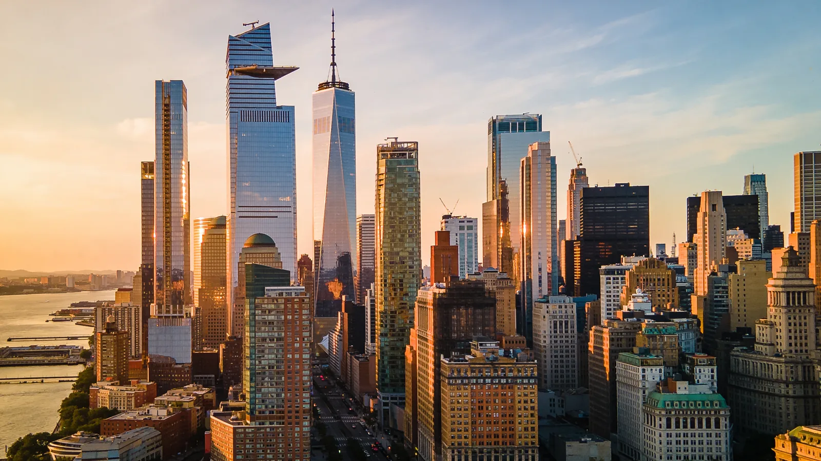 Lower Manhattan and One World Trade at sunset — the area One World Observatory looks out over for the best observation deck NYC for sunset comparison